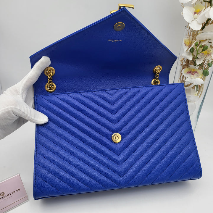 YVES SAINT LAURENT BLUE QUILTED MONOGRAM ENVELOPE