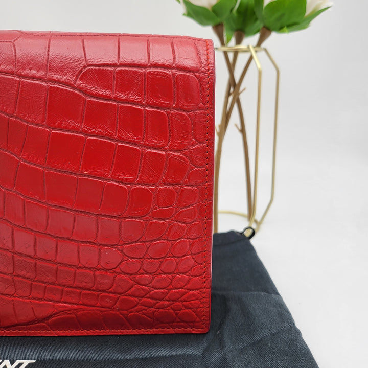 YVES SAINT LAURENT EMBOSSED CROC LEATHERCLUTCH