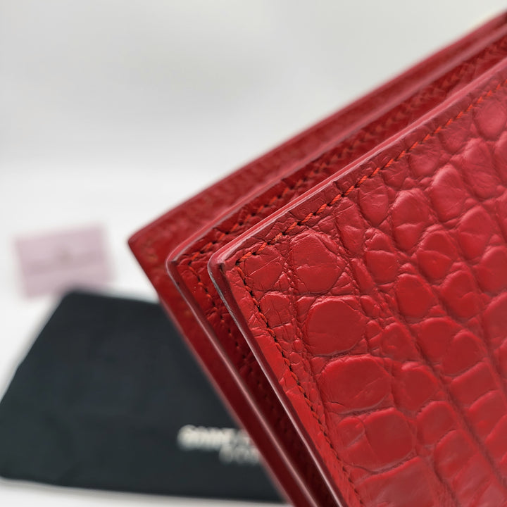 YVES SAINT LAURENT EMBOSSED CROC LEATHERCLUTCH