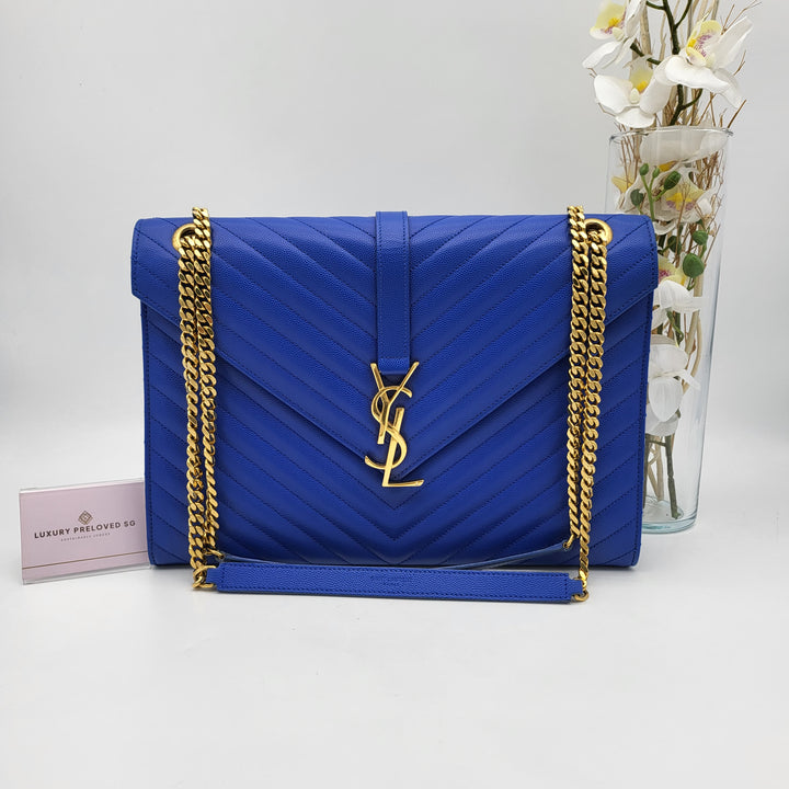 YVES SAINT LAURENT BLUE QUILTED MONOGRAM ENVELOPE