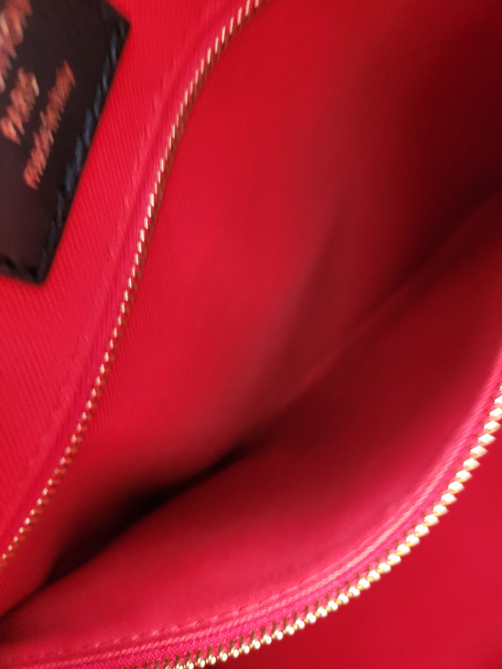 LOUIS VUITTON ON THE GO MM REVERSED