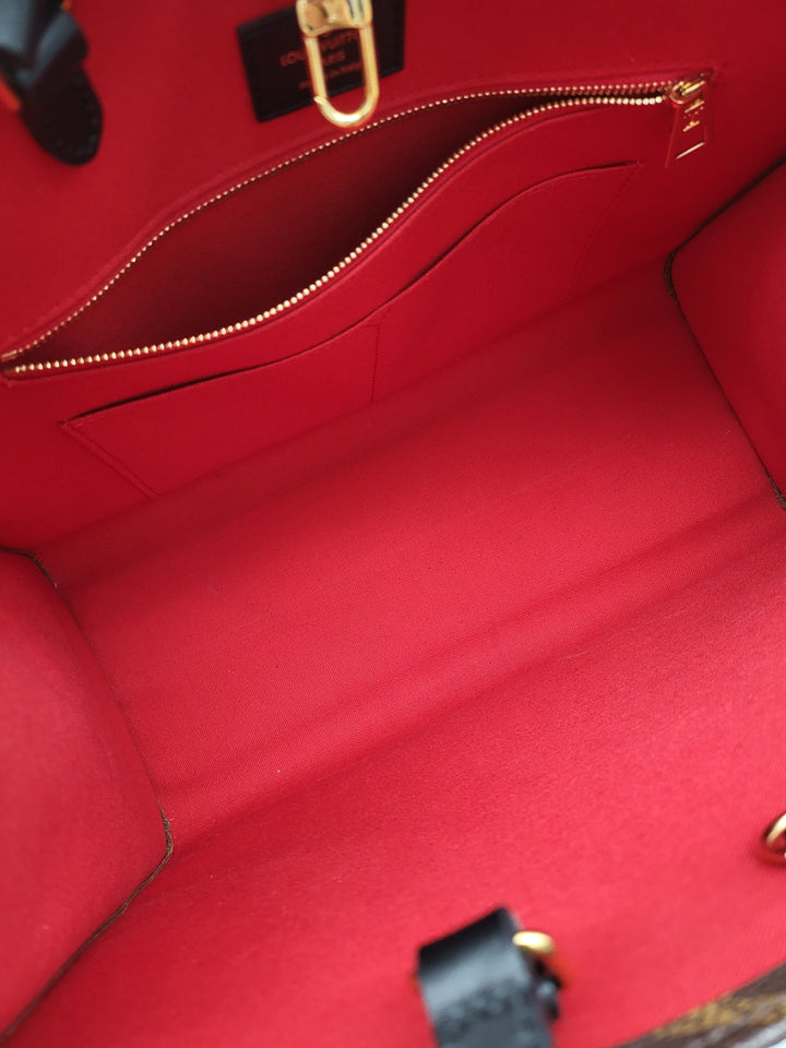 LOUIS VUITTON ON THE GO MM REVERSED