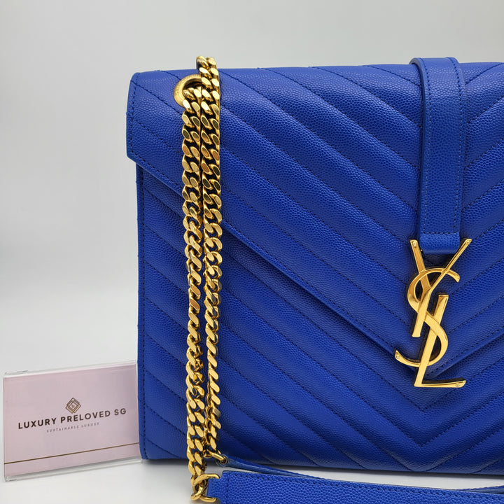 YVES SAINT LAURENT BLUE QUILTED MONOGRAM ENVELOPE