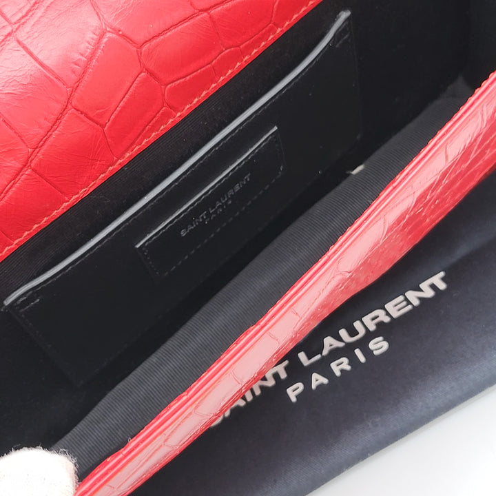 YVES SAINT LAURENT EMBOSSED CROC LEATHERCLUTCH